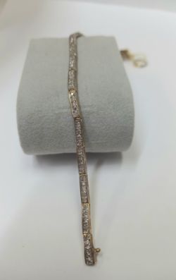 0.93CT DIAMOND BRACELET 9CT YELLOW GOLD. 7