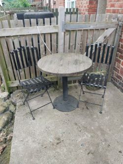COMMERCIAL GRADE EX CAFE TABLE AND 2 FOLDING CHAIRS