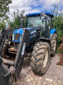 NEW HOLLAND TS115A TRACTOR WITH LOADER – 4WD