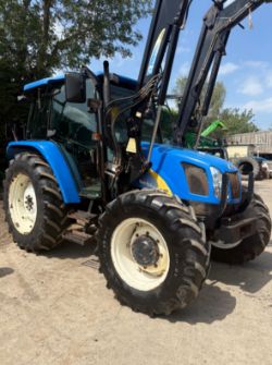 2007 NEW HOLLAND TL100A TRACTOR WITH LOADER