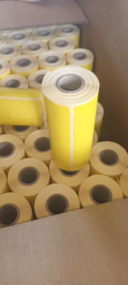 16 BOXES OF 36000 YELLOW LABELS (576,000 CLEAR LABELS)