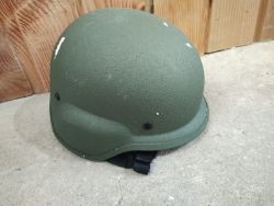 MILITARY HIGH IMPACT HELMET – GREEN, HEAVY, ADJUSTABLE STRAPS – NEW WITH PAINT CHIPS FROM TRANSPORT