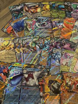 BUNDLE OF X50 EX POKEMON CARDS