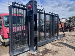 HEAVY-DUTY SLIDING STEEL YARD GATE WITH SIDE PEDESTRIAN GATE