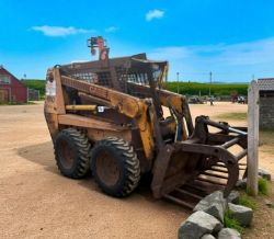CASE SKID STEER WITH GRAB