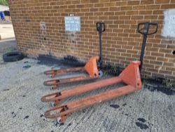 2X PUMP TRUCKS 1 LONG REACH ONE WIDE PALLET
