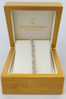 0.93CT DIAMOND BRACELET 9CT YELLOW GOLD. 7