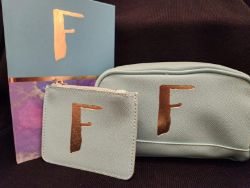 BEAUTIFUL SET OF 'F' NOTEBOOK, A MAKE-UP BAG AND A WALLET FOR COINS AND CARDS