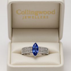 18CT WHITE GOLD MAQUISE 1CT TANZANITE & 0.80CT PRINCESS DIAMOND RING+ VALUATION CERTIFICATE £3495