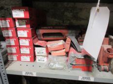 Contents of shelf to include Hilti nuts, bolts, nails, Mastic gun, etc.