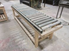 Gravity roller conveyor, 2.5m x 630mm mounted on timber frame 1 x metal frame gravity roller