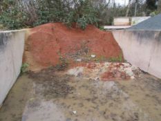 Approx 5 ton of hardened red sand