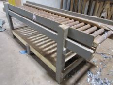 Gravity roller conveyor, 2.5m x 600mm mounted on timber frame