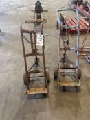 Two triple wheeled gas bottle trollies