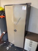 Metal 2 door storage cabinet and contents to include metal cutting compound, paint brushes, anti spa