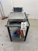 Cinell stainless steel bench top weighing scales, model PA81015, 240v, mounted on metal 2-shelf