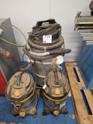 Three assorted commercial vacuums