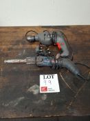 Two assorted hand held tools to include Ozito drill and Silverline power belt