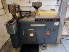 Manumold 77/30 injection moulding machine (1991)