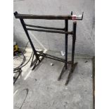 Two metal height adjustable trestles