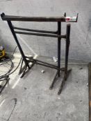Two metal height adjustable trestles