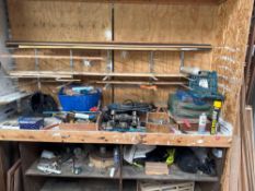 Contents of work bench to include various hand tools, double ended grinder, crowbars and air hose as
