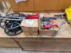 Three banding tools with three part used clips and a crimper