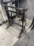 Two metal height adjustable trestles