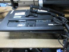 Four flat screen monitors, two desk mounting monitor arm