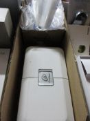 Tote box containing Cochlear box fitting software, assorted self sealing small harps