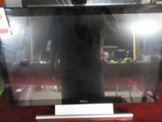 Three Dell flat screen monitors