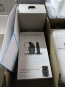 Tote box containing vibe complete behind the ear hearing aid, Widex behind the ear hearing aids,