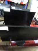 Four flat screen monitors with 2 x desk mounting monitor arm