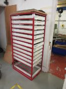 Metal framed thirteen tray storage rack