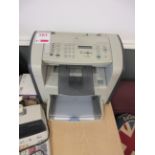 HP Laserjet 3050 fax machine and Sharp EL/1607P paperback calculator