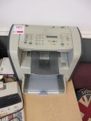 HP Laserjet 3050 fax machine and Sharp EL/1607P paperback calculator