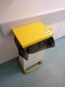 Foot operated waste bin