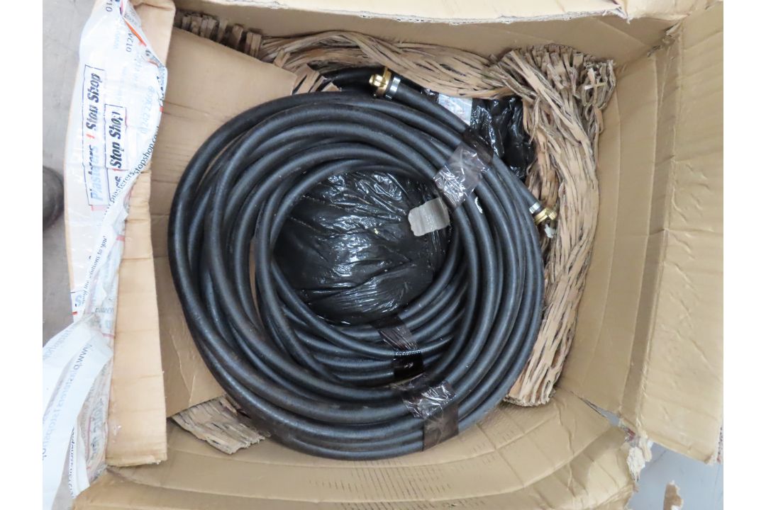 A Box of Unused Quick Release Piping/Hose.