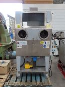 A Magido Model HP25M Heated Cleaner