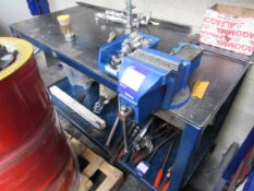 Heavy-duty steel workbench with vice