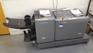 Duplo DBM-120 stapler folder Serial number 050400196, meter count 1289018 with Duplo DBM-T120T