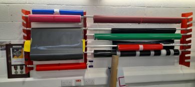 Two wall mount roller racks & two lin bin racks (includes contents)