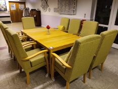 9 x Green upholstered high backed chairs with easy push wheels, 3 x mobile wooden tables
