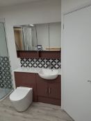 Rusty red bathroom vanity unit fitted sink & taps, matching wall unit over & toilet bowl (no