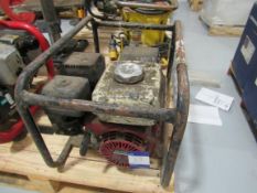 Honda powered generator. Located in Corby