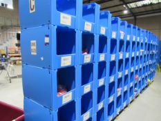 Large quantity of assorted clothing to part row C (including corrugated pigeon holes)