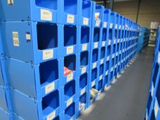 Large quantity of assorted clothing to part row I (including corrugated pigeon holes)