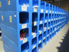 Large quantity of assorted clothing to part row F (including corrugated pigeon holes)