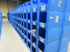 Large quantity of assorted clothing to part row G (including corrugated pigeon holes)