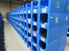 Large quantity of assorted clothing to part row D (including corrugated pigeon holes)